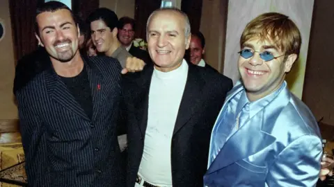 Peter Macdiarmid Gianni Versace, Elton John and George Michael at the Bond St Versace store, 1995