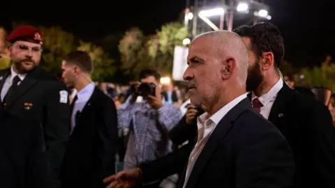 AFP Ronen Bar (R), head of Israel's Shin Bet domestic security agency, attends a ceremony marking Holocaust Remembrance Day, at the Yad Vashem World Holocaust Remembrance Centre, Jerusalem, on 23 April 2024