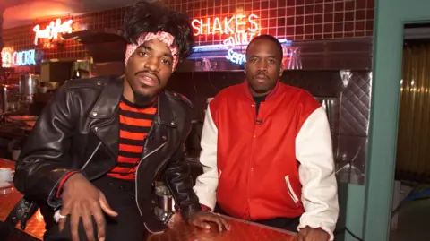 Getty Images Outkast pose in a diner, circa 2002