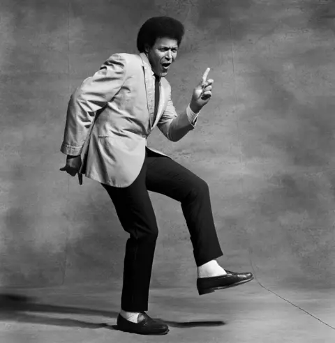Getty Images Chubby Checker, photographed in black and white, does his signature dance, The Twist