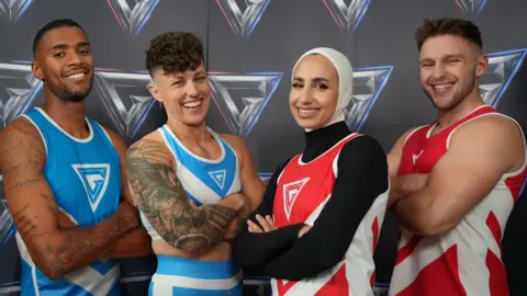 BBC/Hungry Bear Media Ltd Two men and two women looking at the camera, smiling and with their arms folded. Tio are in blue and two are in red.