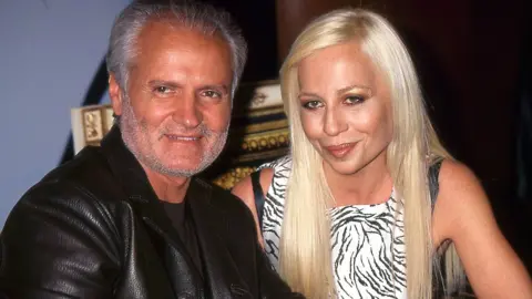 Getty Images Gianni and Donatella Versace pictured together in New York in 1995