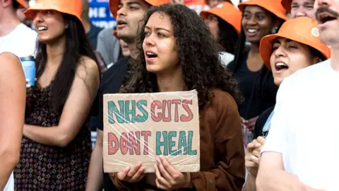 Getty Images Junior doctors take part in a rally outside Downing Street as members of the British Medical Association walk out for five days in a strike action over pay in the run up to the general election in London, United Kingdom on June 27, 2024