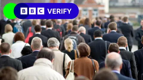 BBC A photo of a crowd of people walking away from the camera