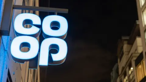 Getty Images Co-op sign lit up at night in London