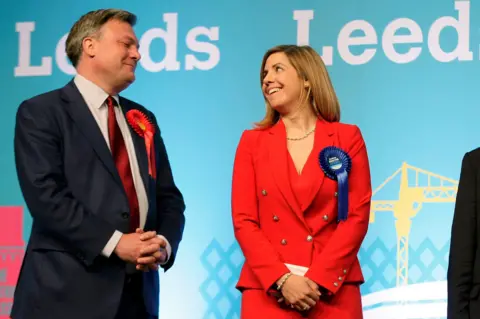 Reuters Conservative candidate Andrea Jenkyns celebrates after being elected as a member of parliament for Morley and Outwood, while Britain