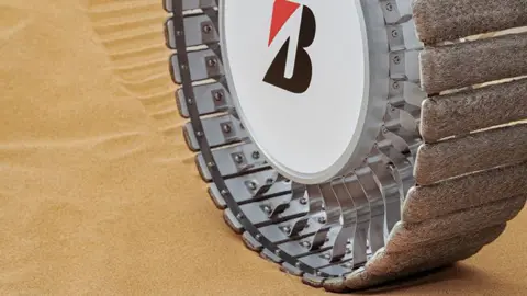 Bridgestone A Bridgestone tyre, with felt-like pads on its rim.