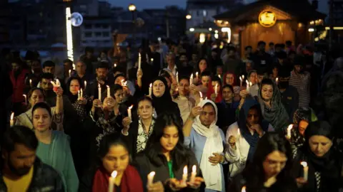 Reuters Demonstrators hold a candle light vigil to condemn a suspected militant attack on tourists near south Kashmir’s scenic Pahalgam, in Srinagar April 23, 2025. REUTERS/Adnan Abidi