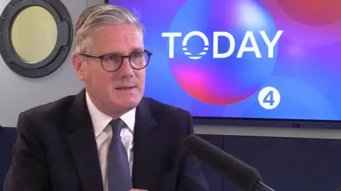 BBC Keir Starmer wearing a suit and sitting in front of the logo for BBC Radio 4's Today programme