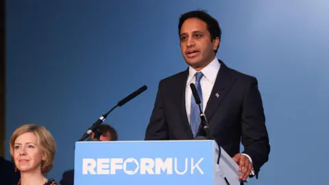 Getty Images Zia Yusuf, chairman of Reform UK, during a news conference in London, UK, on Tuesday, May 27, 2025.
